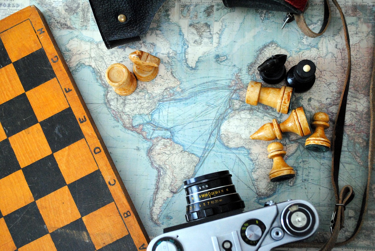 An image of a chessboard and a map introducing the idea of chess culture differs around the world